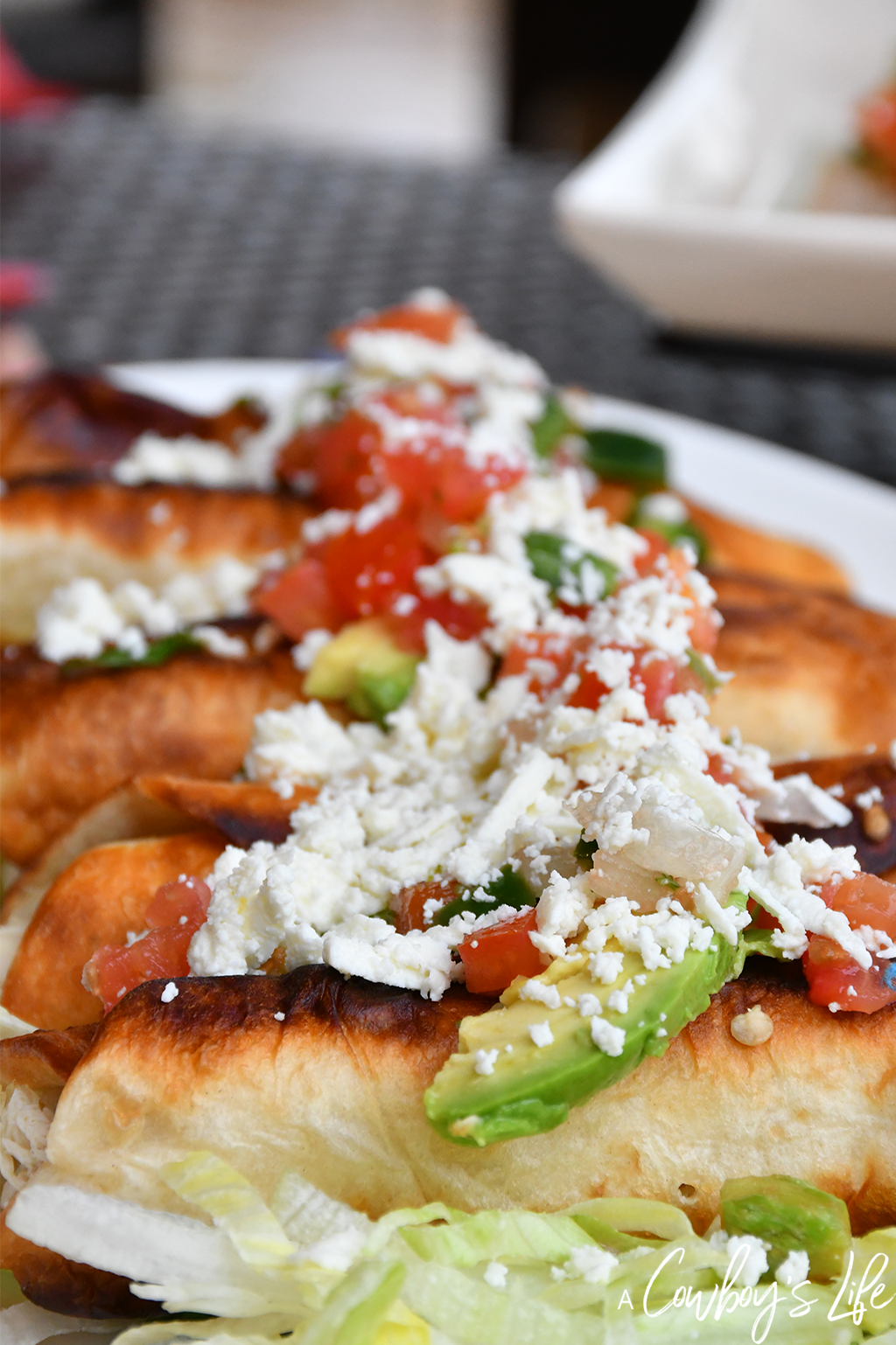 Fried chicken flautas on table 