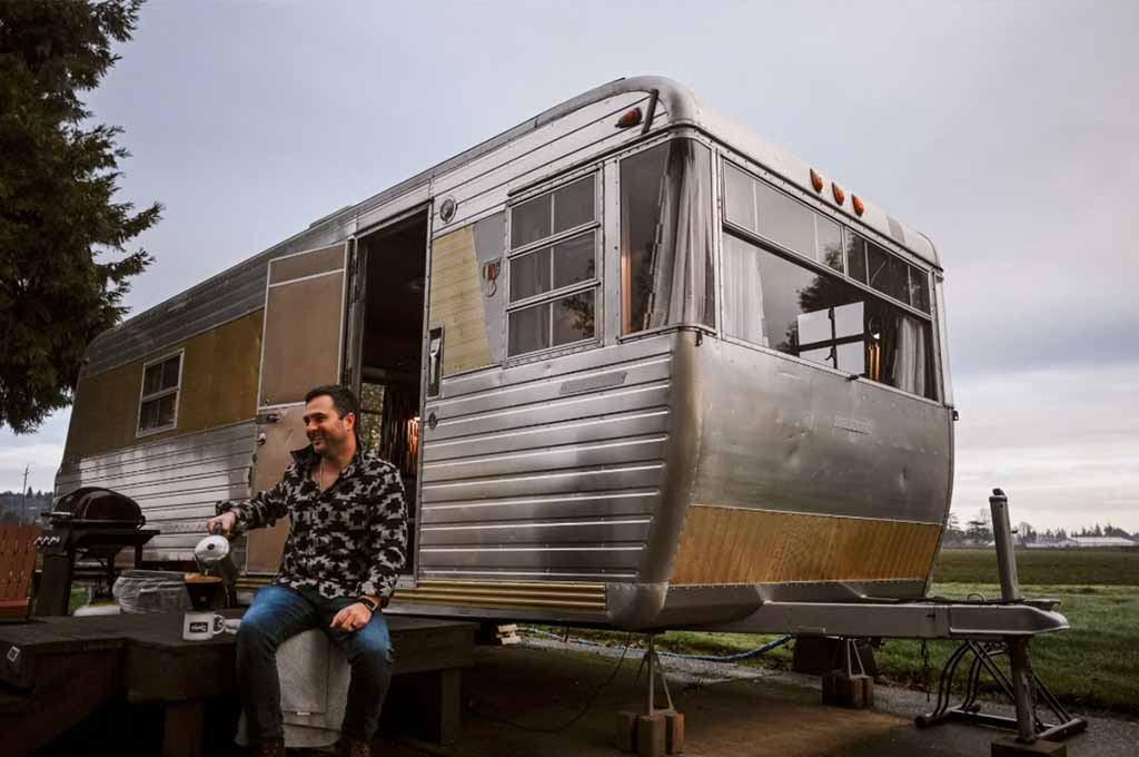 Man sitting in front of RV